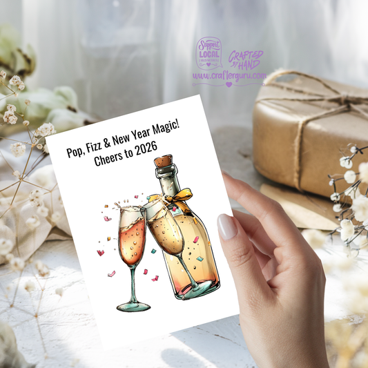 Pop, Fizz & New Year Magic – Cheers to 2026 Greeting Card – CRD-NY-001